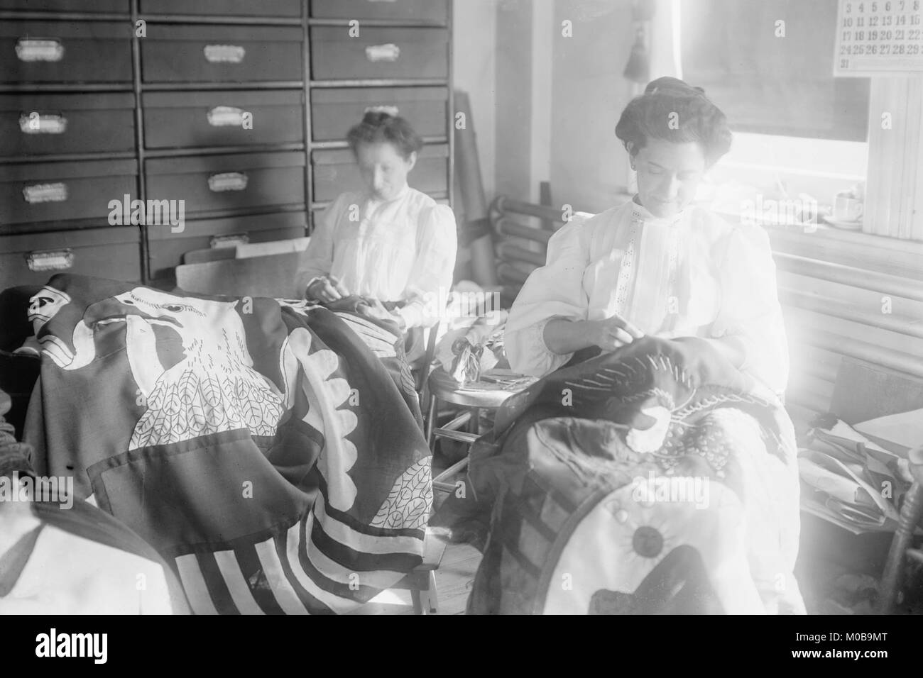 Seamstresses at the Brooklyn Navy Yard Sew Large Flags with Eagles Stock Photo