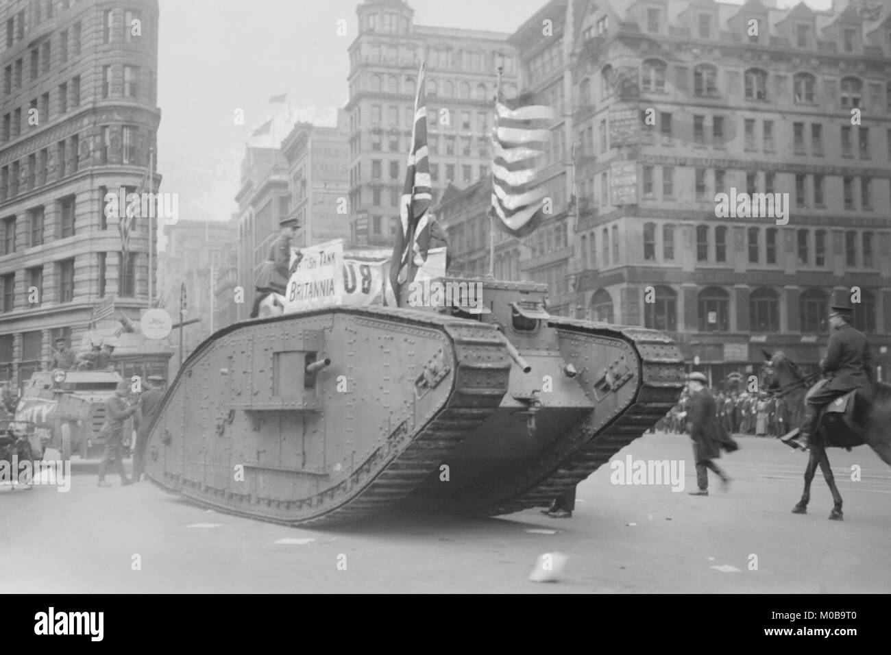 British tank sporting an American Flag tracks down Fifth Avenue, New York Stock Photo