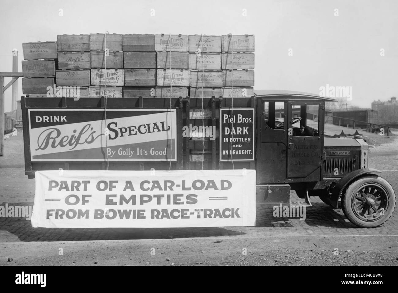 Truck load of empty bottles in boxes from racetrack Stock Photo