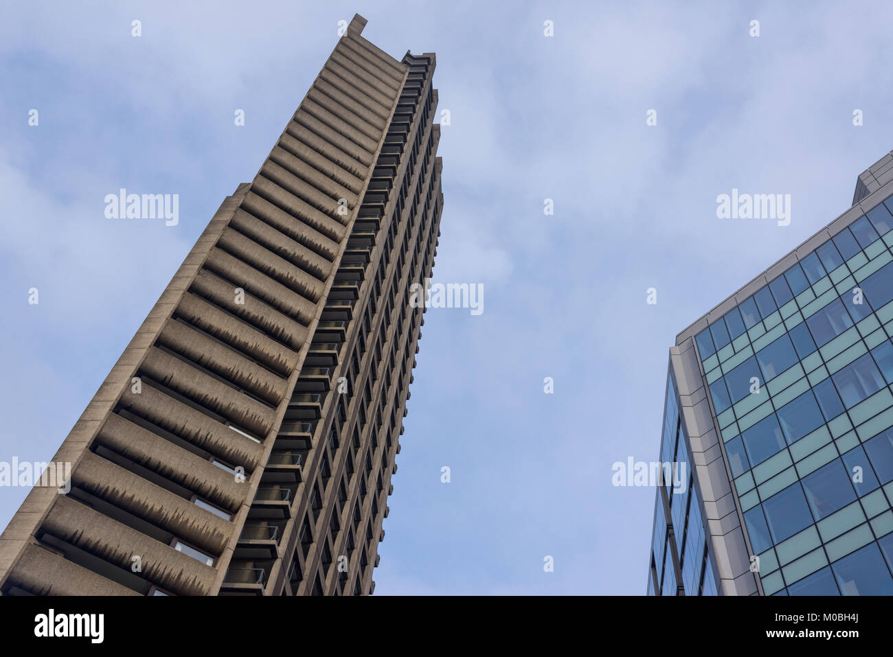London, UK - January 2018. The Barbican Estate with its recognisable Brutalist architecture and residential skyscraper towers in London, UK. Stock Photo
