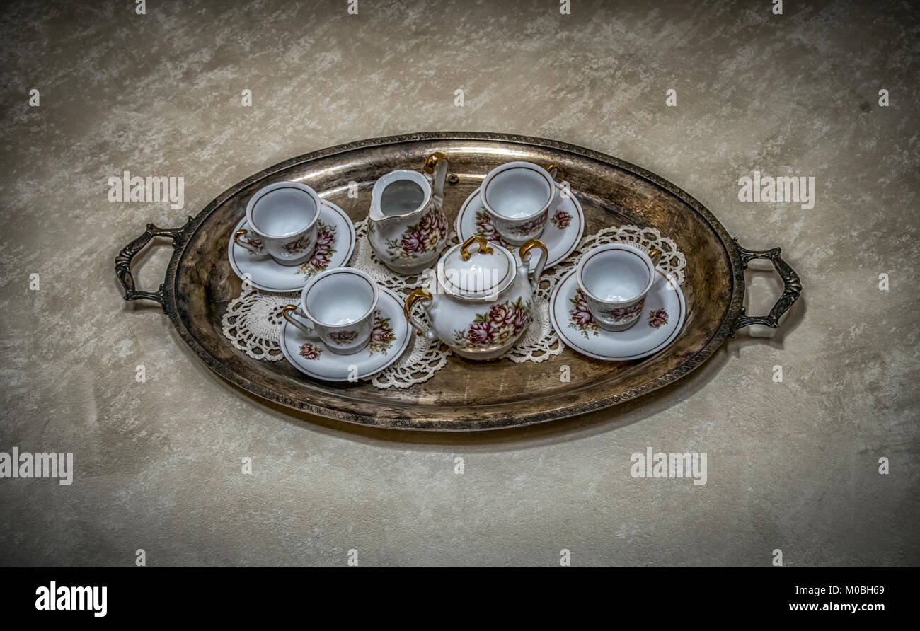 Oldfashioned tea cups on a tray Stock Photo Alamy