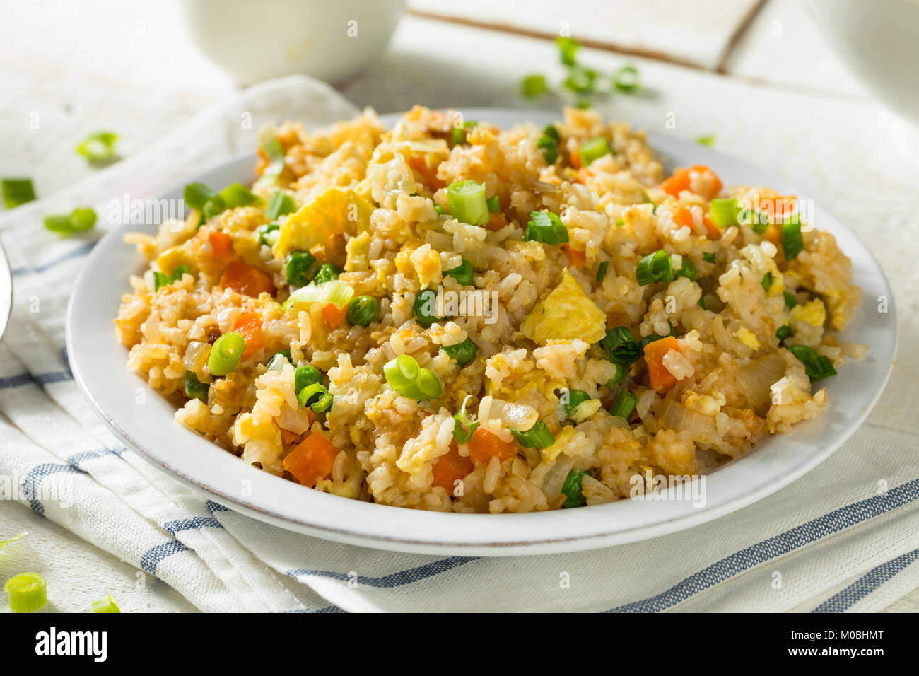 Homemade Vegetarian Fried Rice with Egg Peas and Carrots Stock Photo