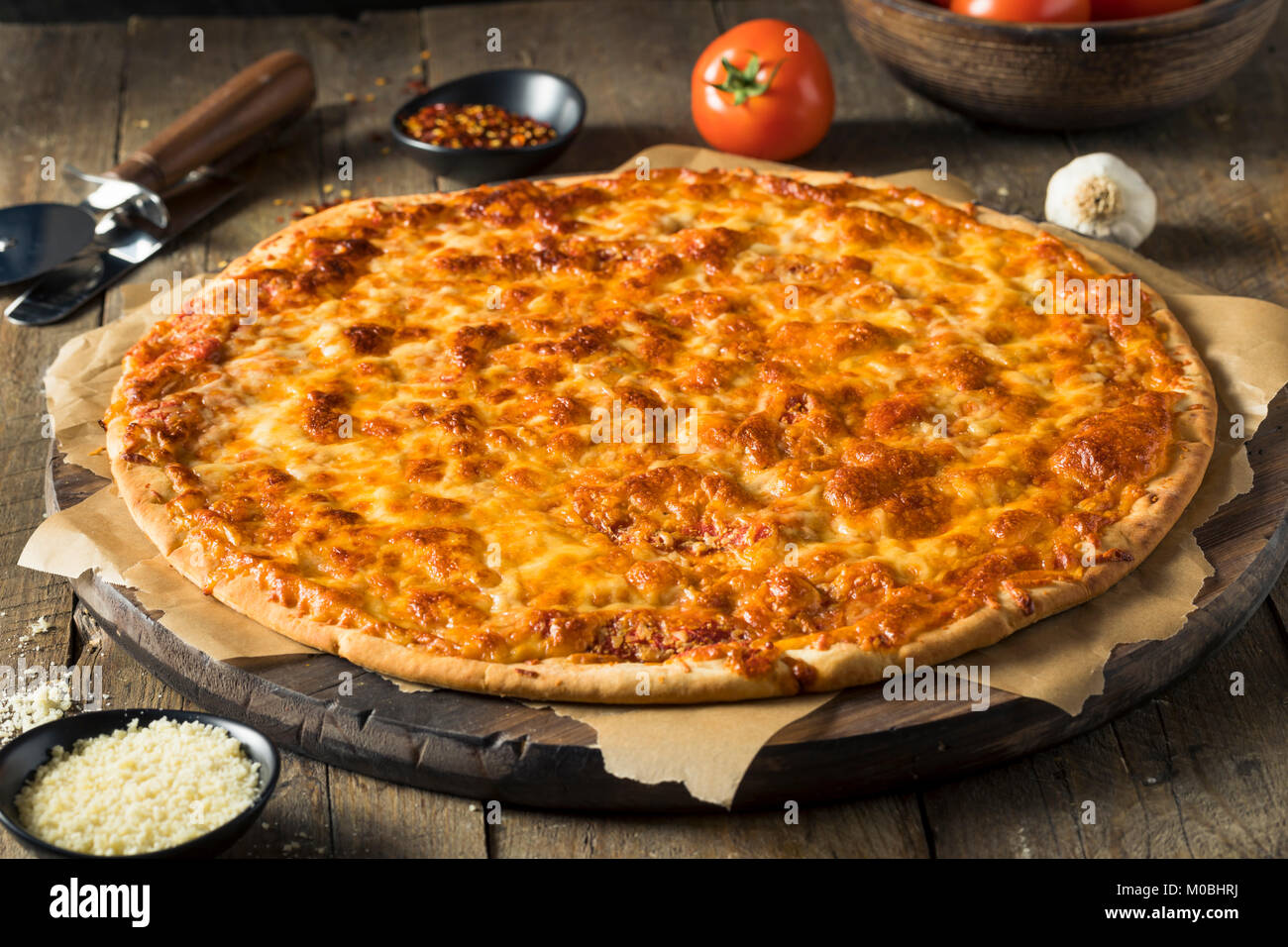 Delicious Homemade Cheese PIzza Cut into Square Slices Stock Photo