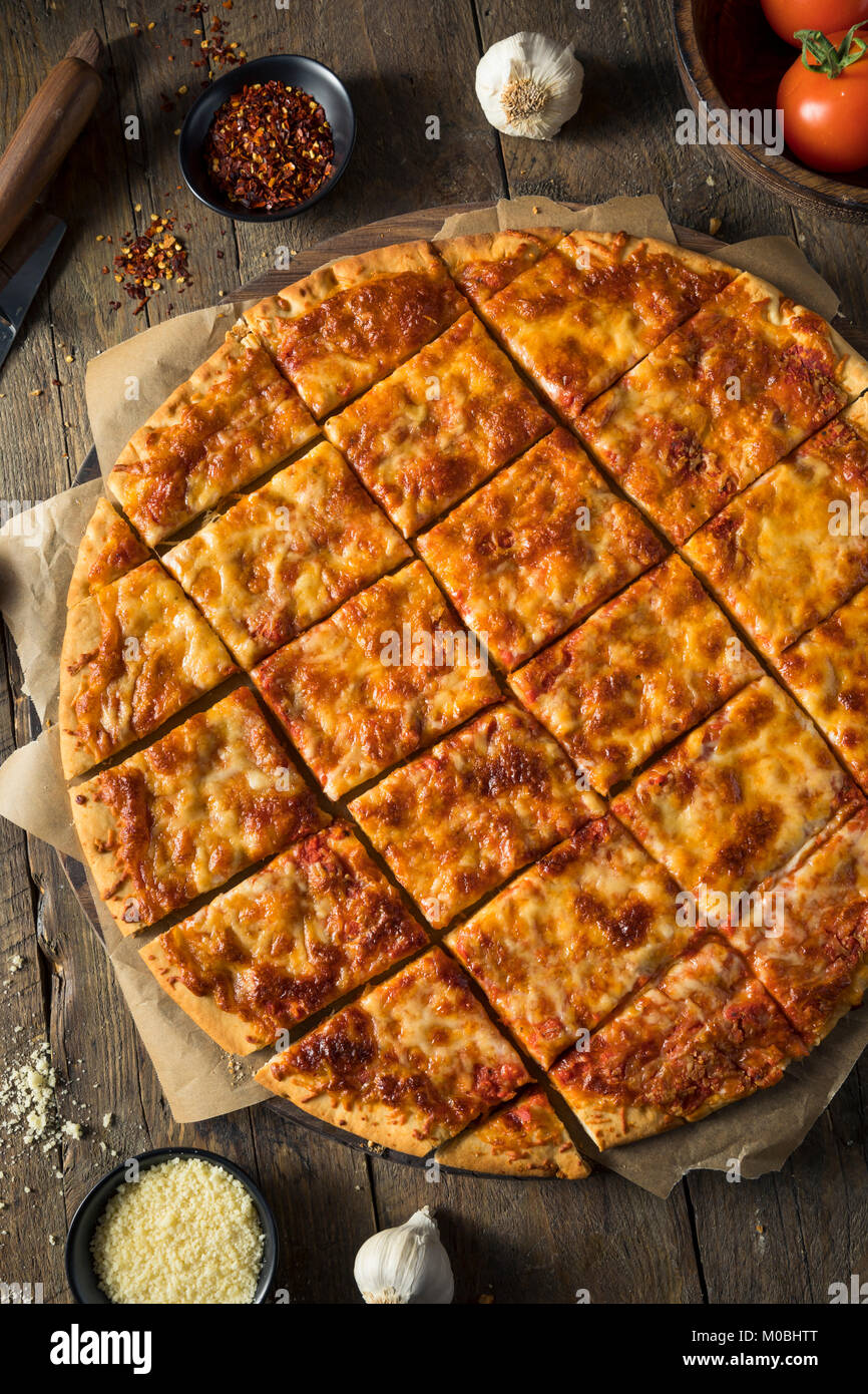 How to Cut a Square Pizza? 