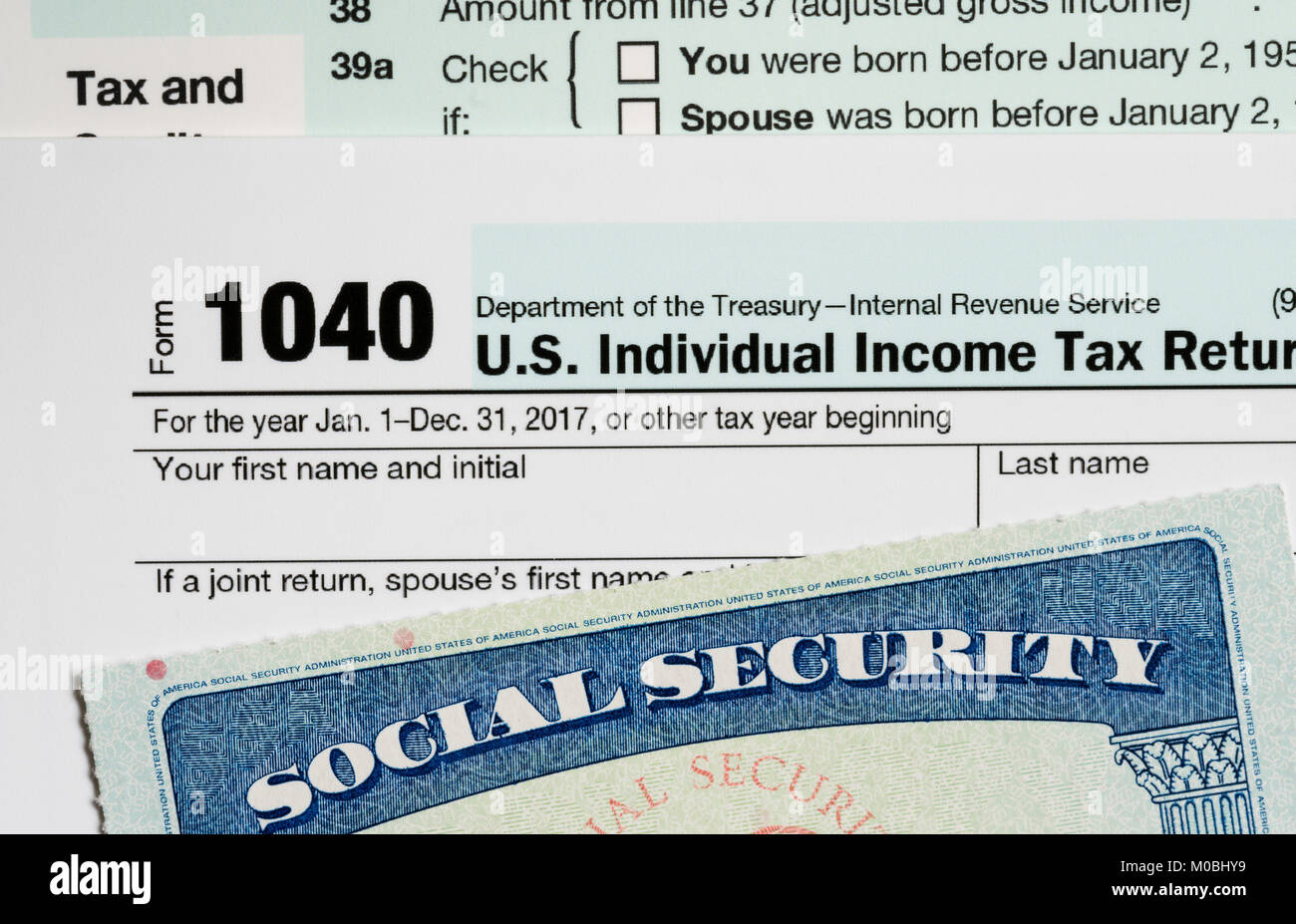 USA Social Security Card on calculations of tax for retirement Stock Photo