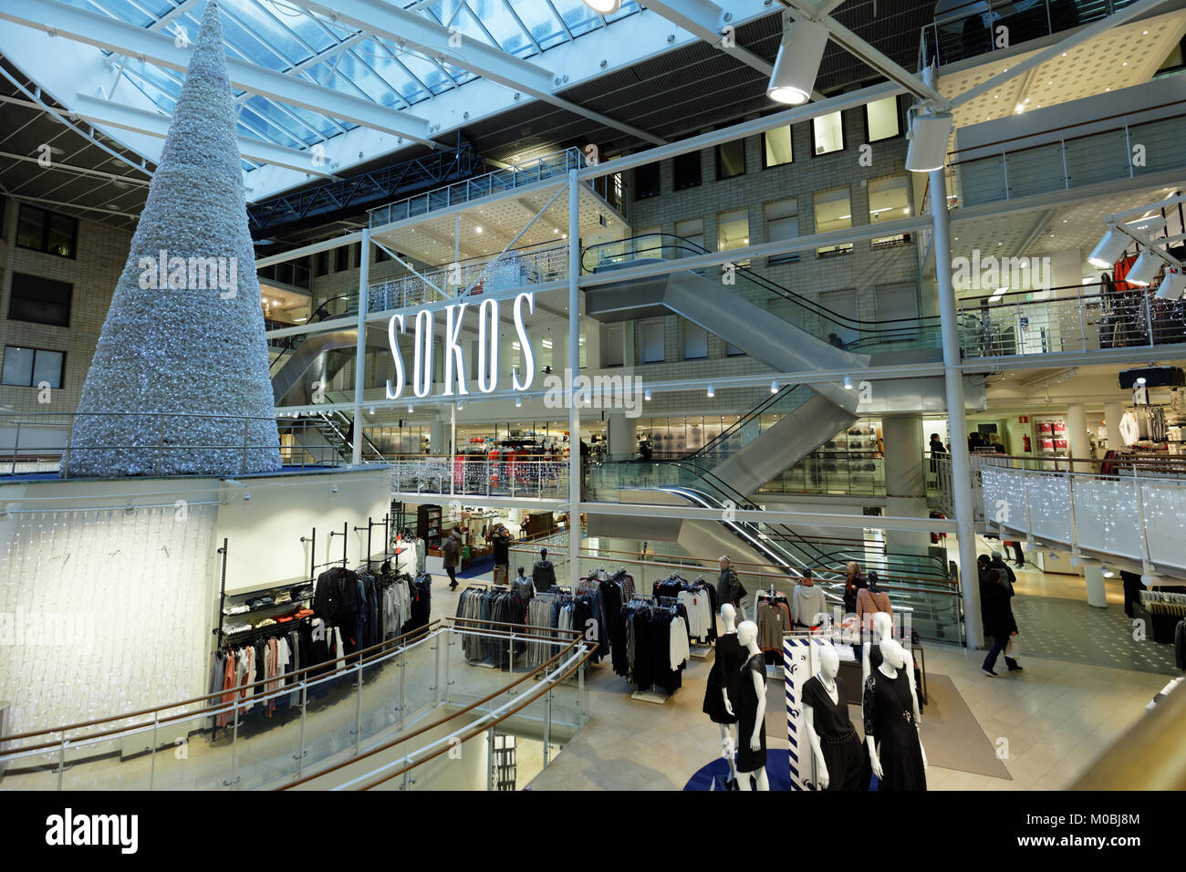 Helsinki, Finland - November 26, 2016: People in the central department store Sokos decorated for Christmas. Sokos is a chain of department stores in  Stock Photo