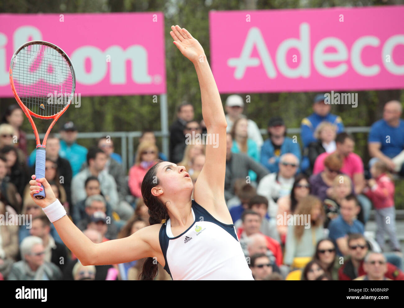 KHARKOV, UKRAINE - APRIL 21, 2012: Christina McHail in the match with Lesya Tsurenko during Fed Cup tie between USA and Ukraine in Superior Golf and S Stock Photo