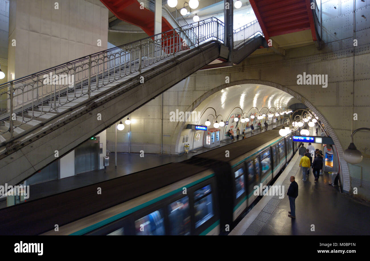 Paris, France - September 13, 2013: Train arrives on the Cite station of metro in Paris, France on September 13, 2013. It's the second busiest metro s Stock Photo