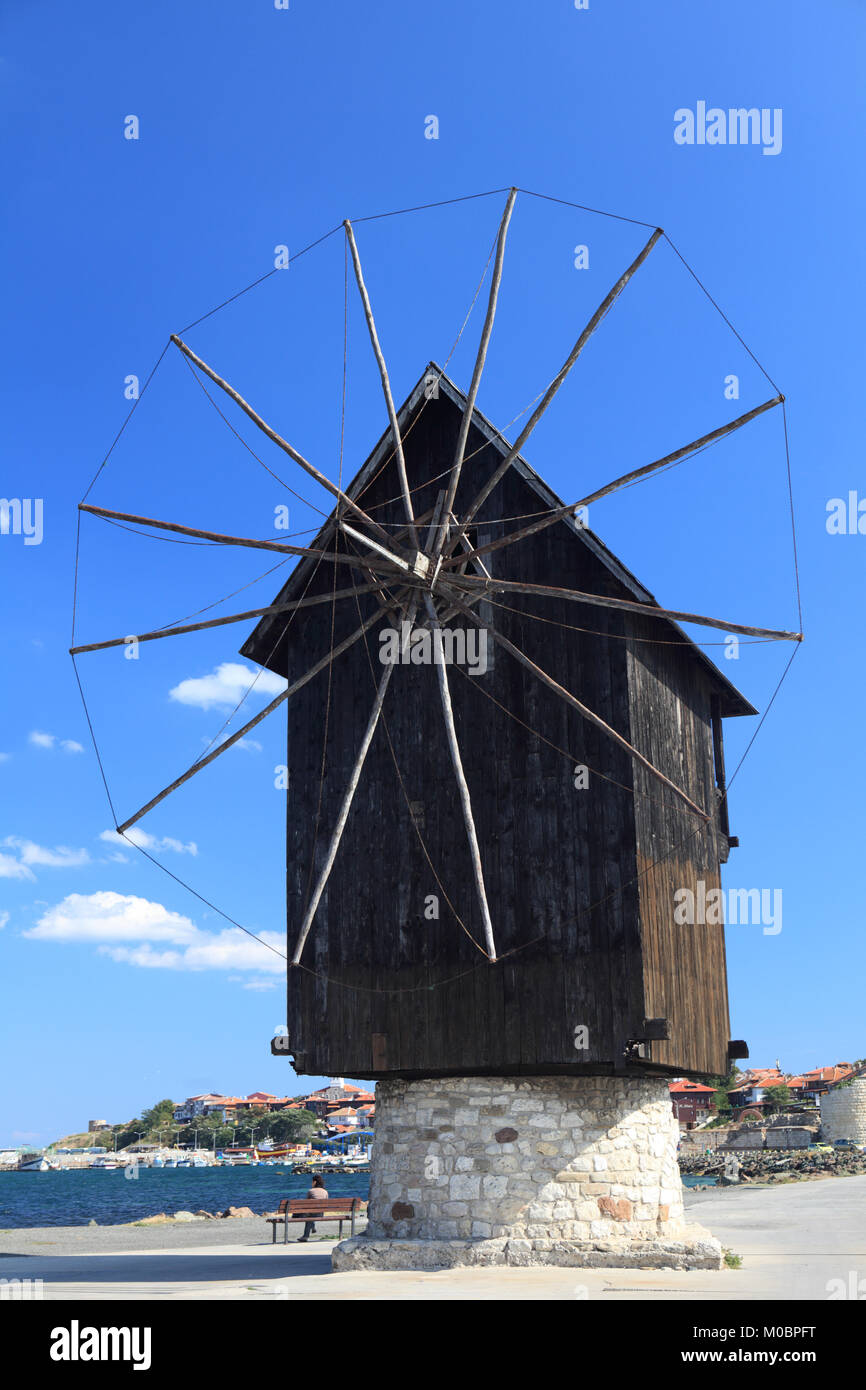 Nessebar, Bulgaria - October 1, 2010: Wooden windmill on the causeway to the Old Town of Nessebar, Bulgaria on October 1, 2010. Ancient City of Nesseb Stock Photo