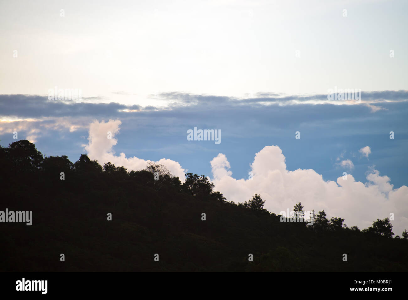 beautiful cloud shapes on the bue bright sky as background Stock Photo