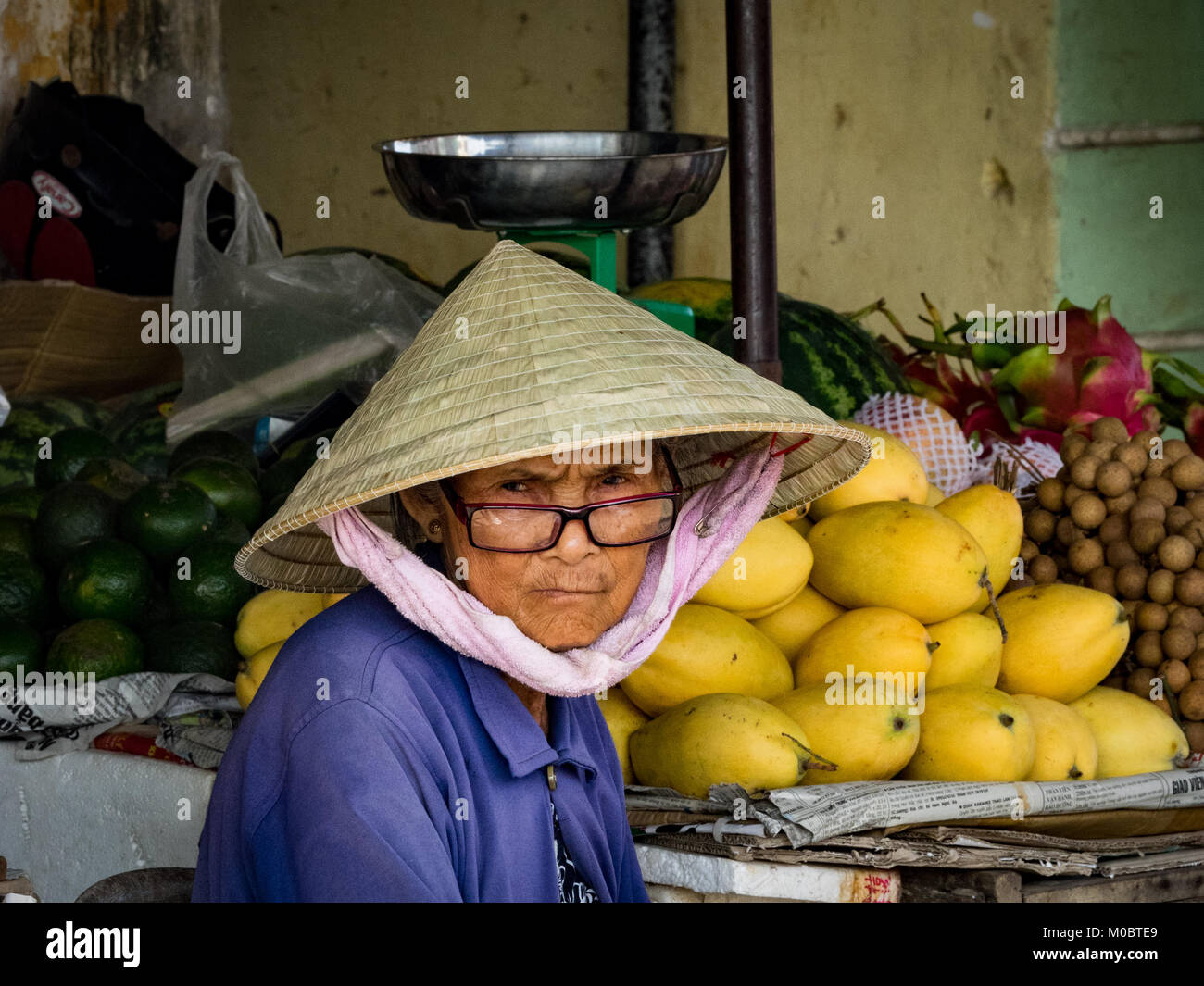 Old ladies selling fruit in Hoi An. Stock Photo