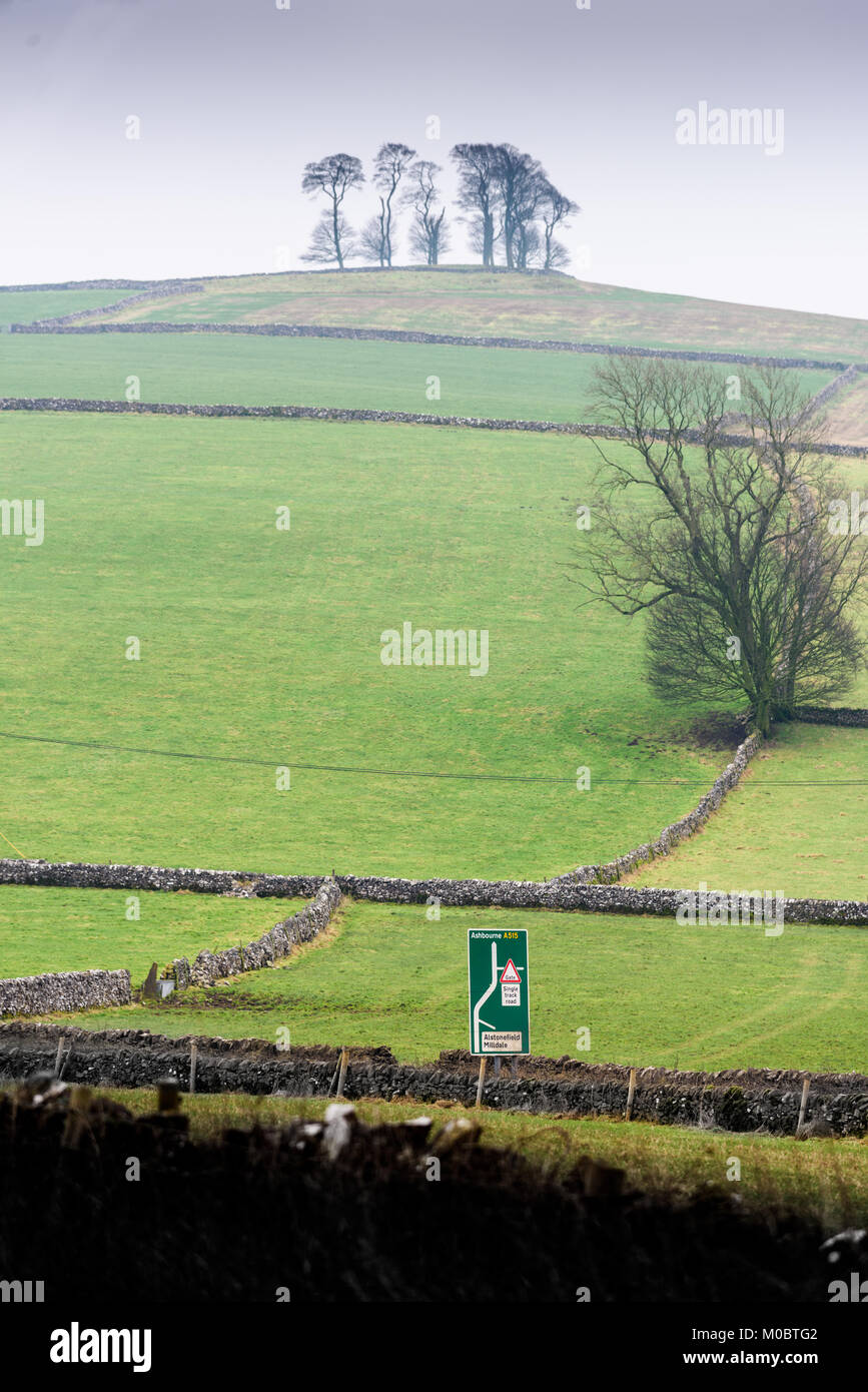 Road sign on the Ashbourne to Buxton road, as seen from the Tissington trail in mid winter on the Peak district at Alsop moor, Derbyshire, England. Stock Photo