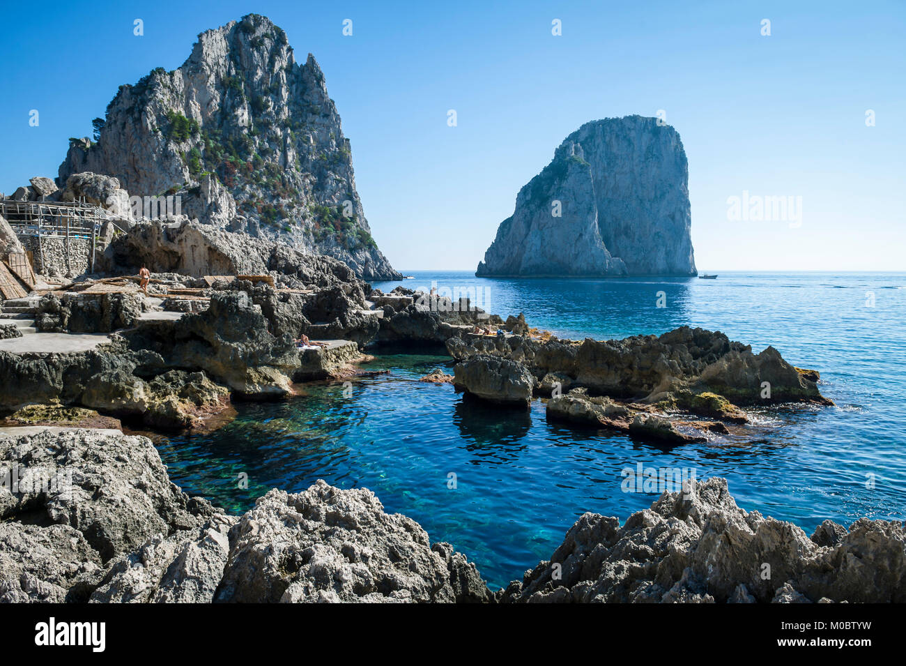 Faraglioni rocks ocean coast swimming hi-res stock photography and ...