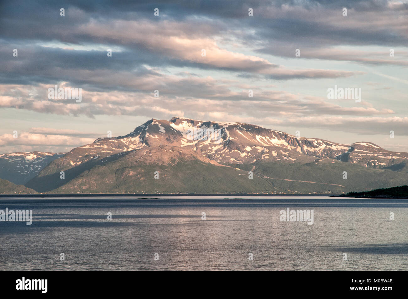 View from Bjerkvik during a Nordic summer night towards Ofotfjord. This fjord was the scene for several naval battles during World War II. Stock Photo