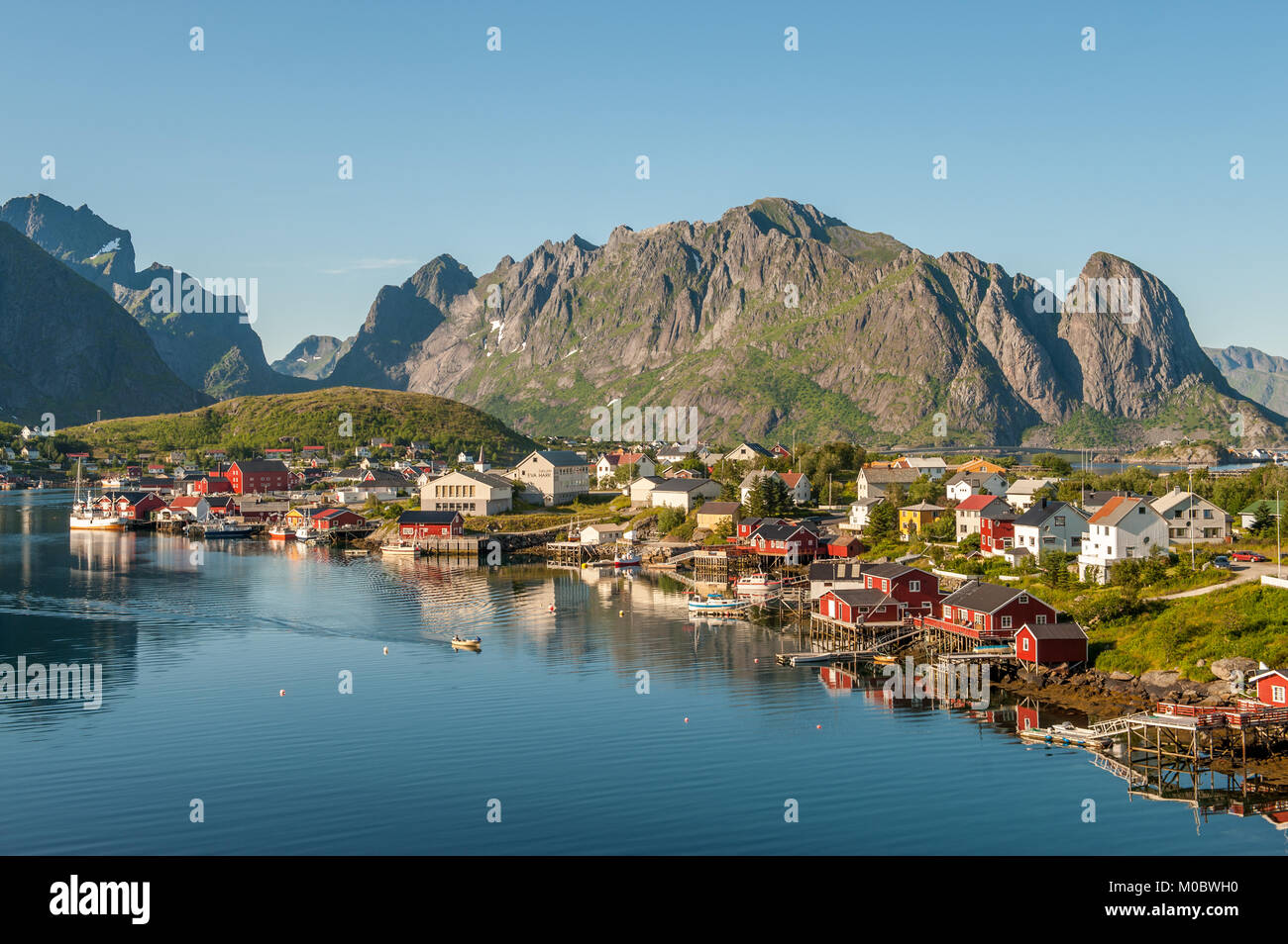 Nordic summer evening on July 4, 2011 in Reine. Reine is a picturesque fishing village and a popular travel destination on Lofoten islands Stock Photo