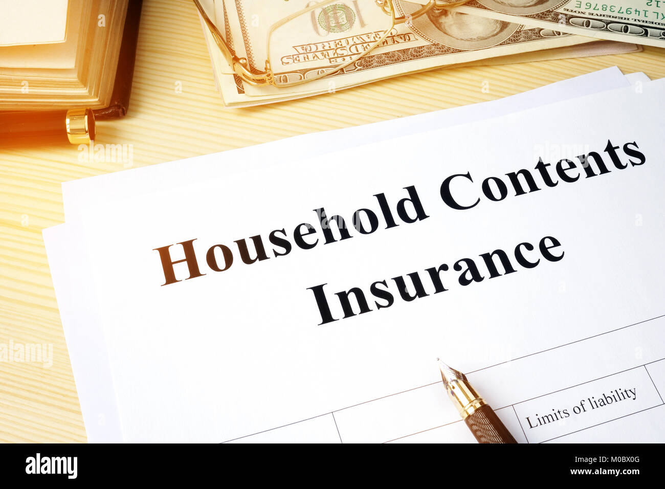 Household contents insurance policy on a desk. Stock Photo