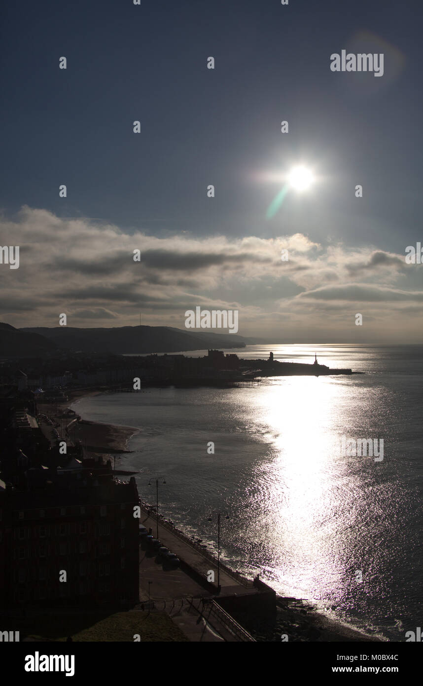 Town of Aberystwyth, Wales. Picturesque silhouetted view of Aberystwyth, viewed from Constitution Hill. Stock Photo