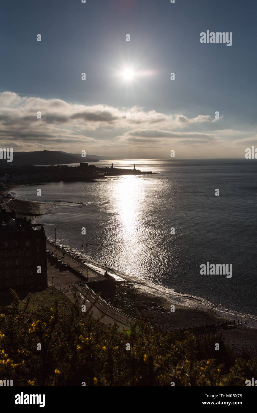 Town of Aberystwyth, Wales. Picturesque silhouetted view of Aberystwyth, viewed from Constitution Hill. Stock Photo