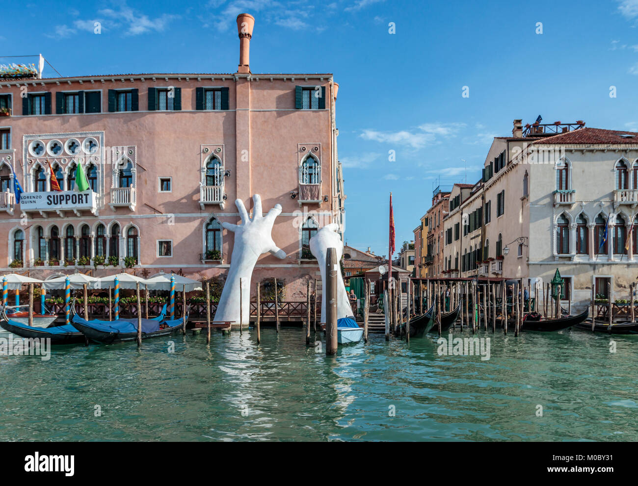 Giant Hands sculpture and the Grand Canal in Venice, Italy