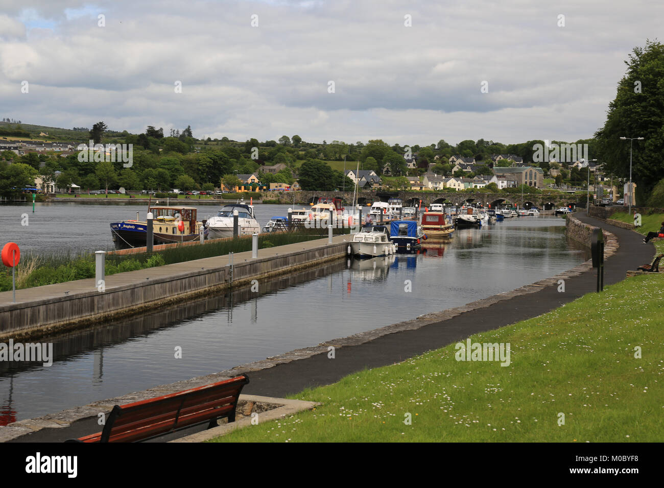 leisure boats moored on the banks of irelands longest river, killaloe