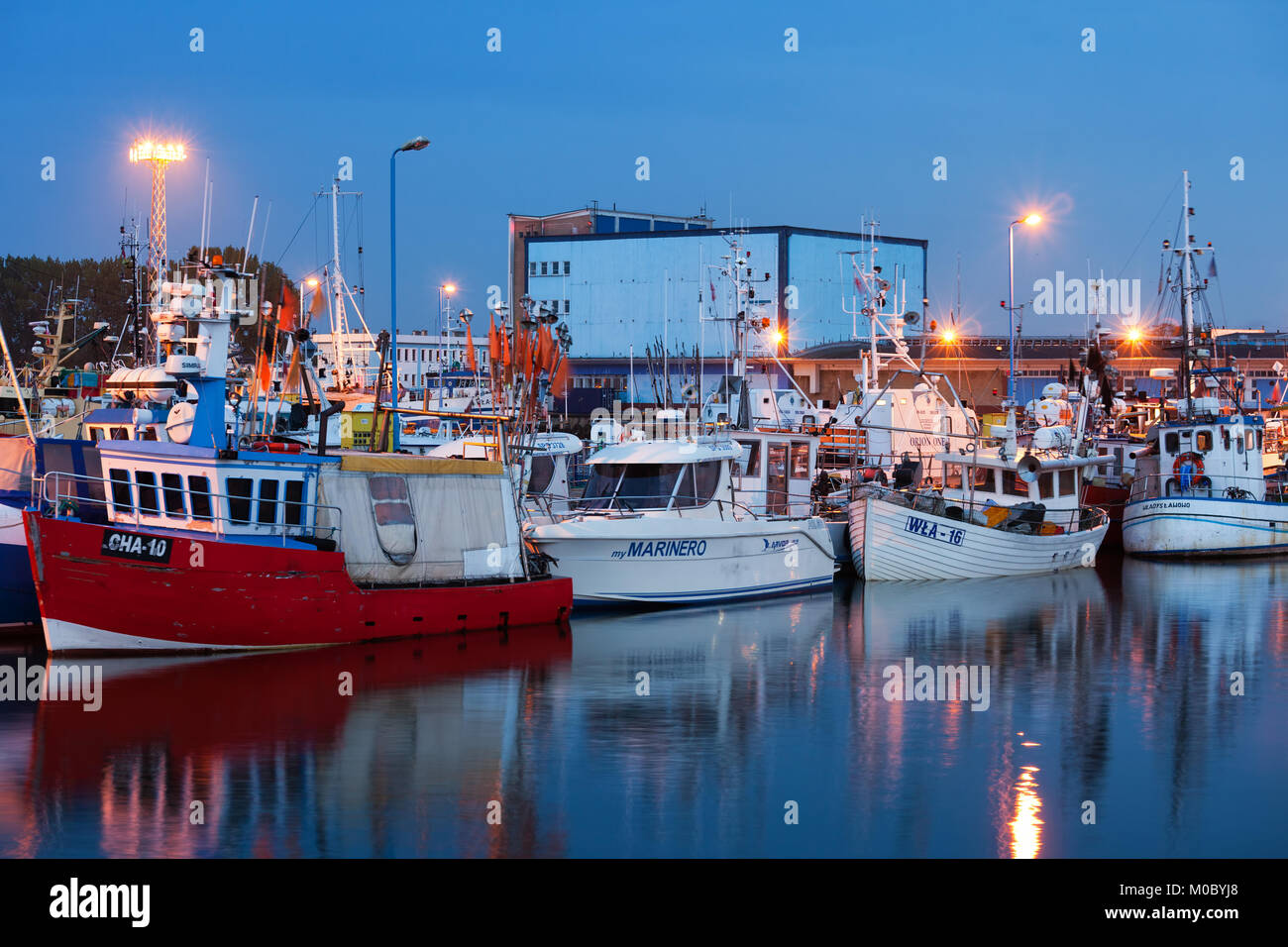 Wladyslawowo at dusk, port with fishing boats at the Baltic Sea in Pomerania, Poland Stock Photo