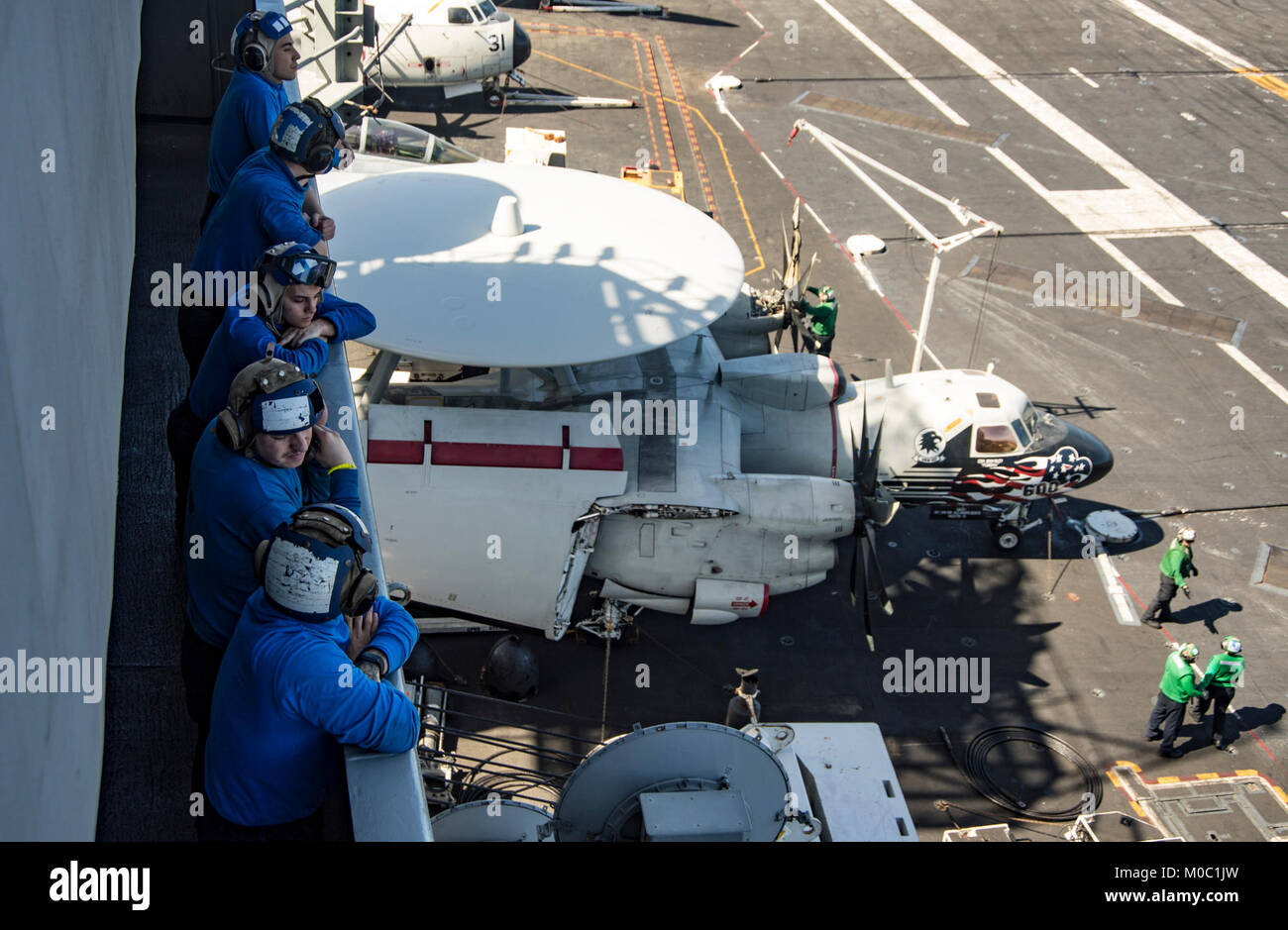 Sailors observe flight operations aboard the Nimitz-class aircraft carrier USS Carl Vinson (CVN 70). Stock Photo