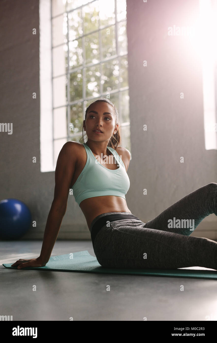 Female in sportswear taking a break after workout – Jacob Lund