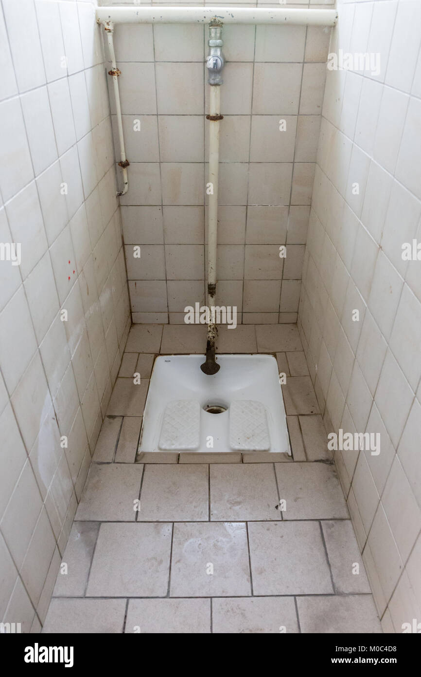 French squat down toilet (toilette à la Turque) Stock Photo