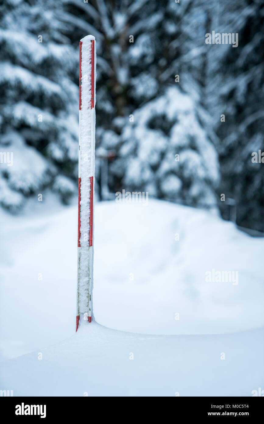 Measuring snow depth with ruler hires stock photography and images Alamy