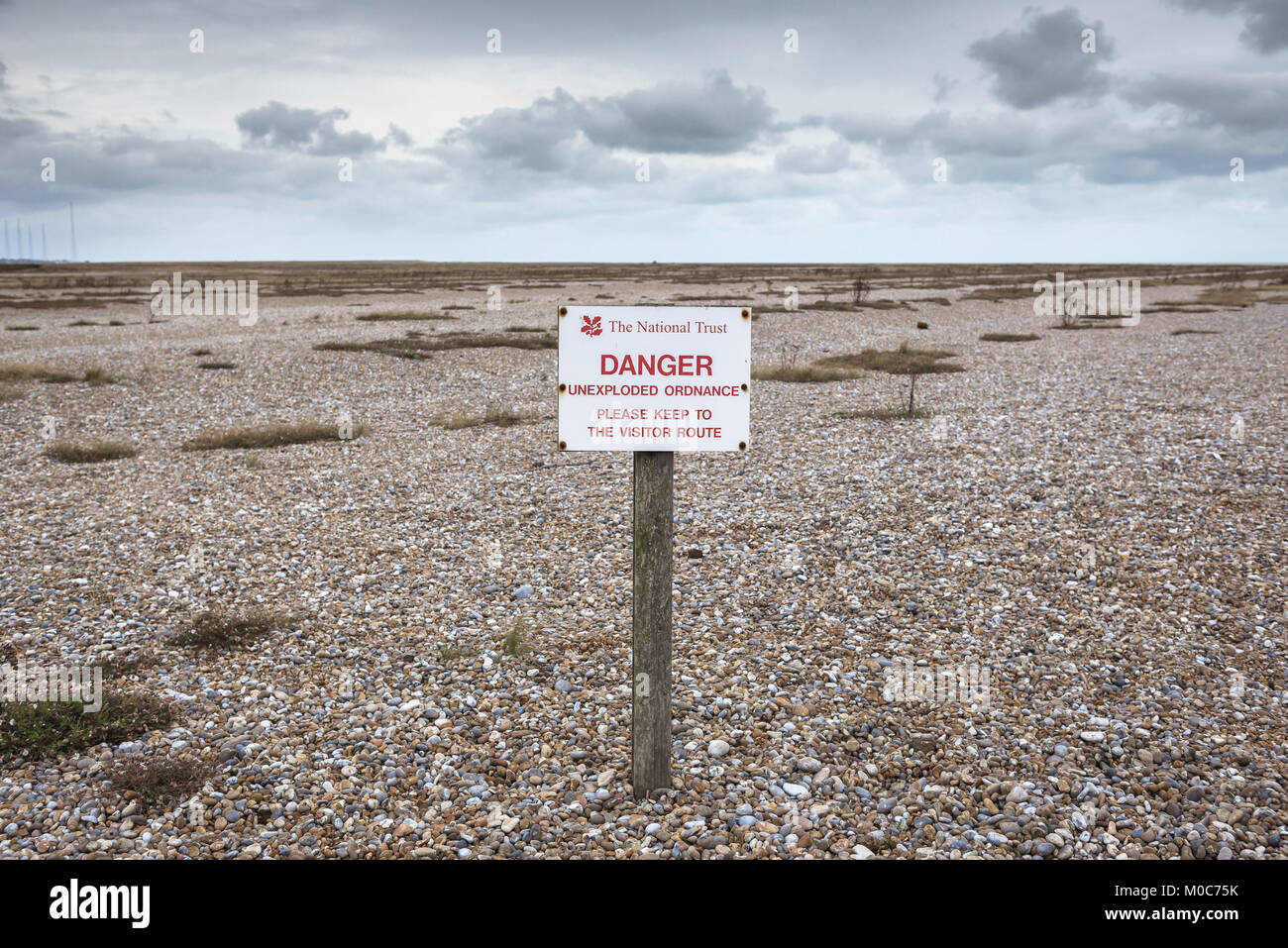 Orford Ness Suffolk, a National Trust sign sited at Orford Ness warning of the dangers to visitors of straying from designated paths, England, UK. Stock Photo