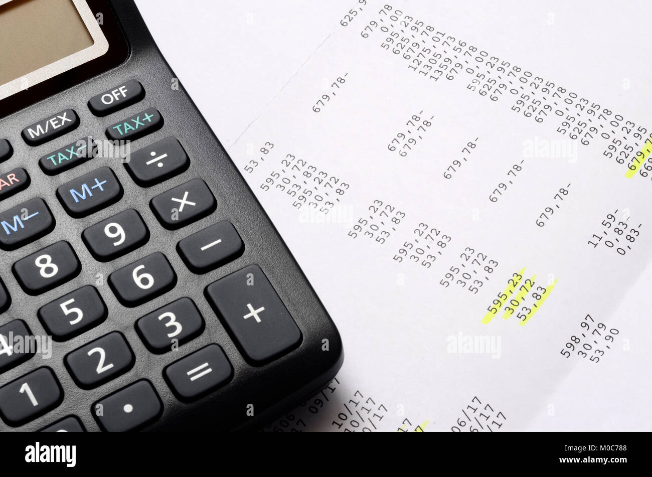 Calculator On Figures Listing For Accounting Background Stock Photo Alamy