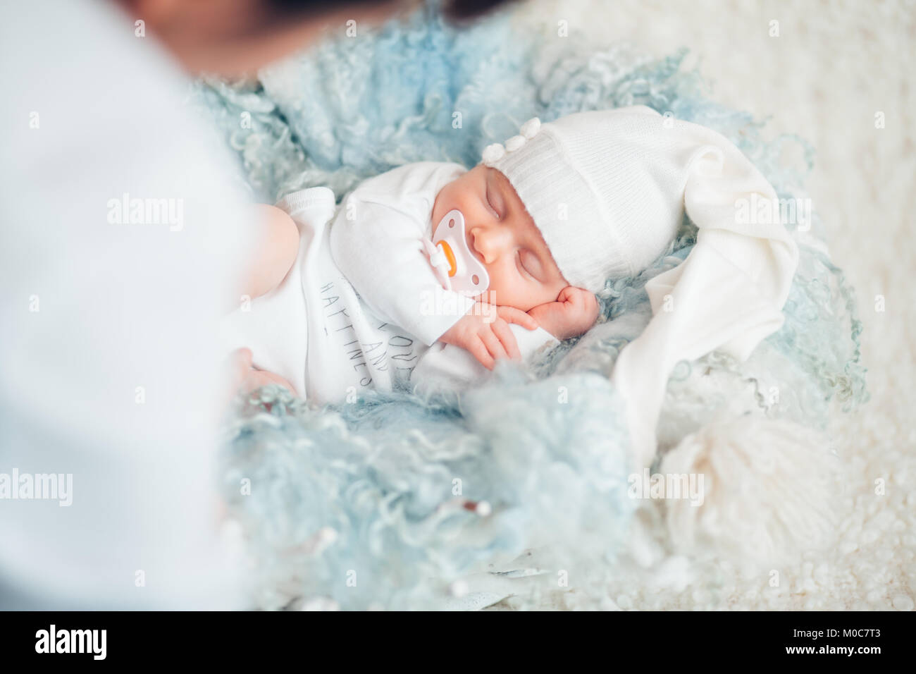 portrait of a newborn with a pacifier Stock Photo Alamy