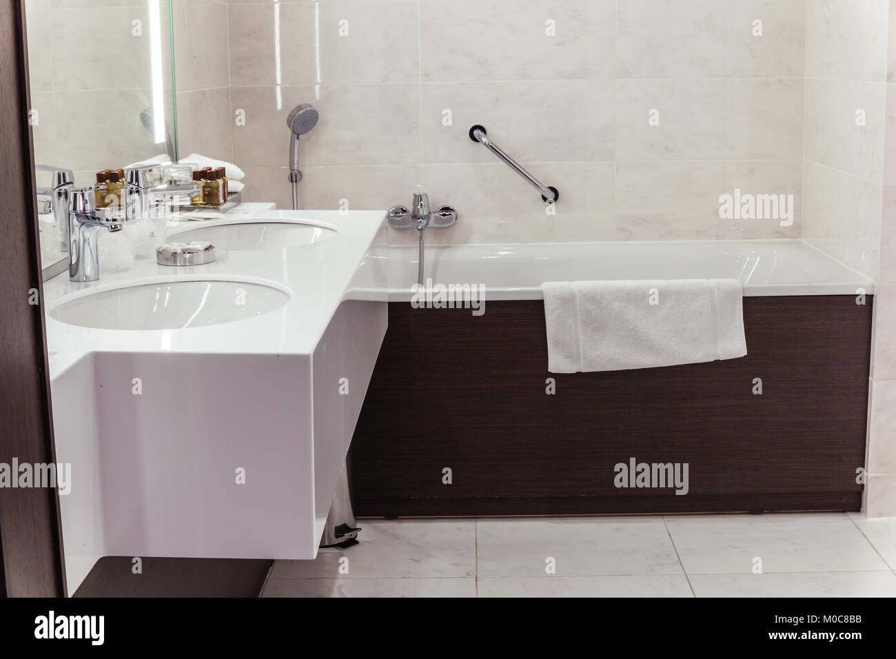 designer bathroom with shower tiling Stock Photo Alamy
