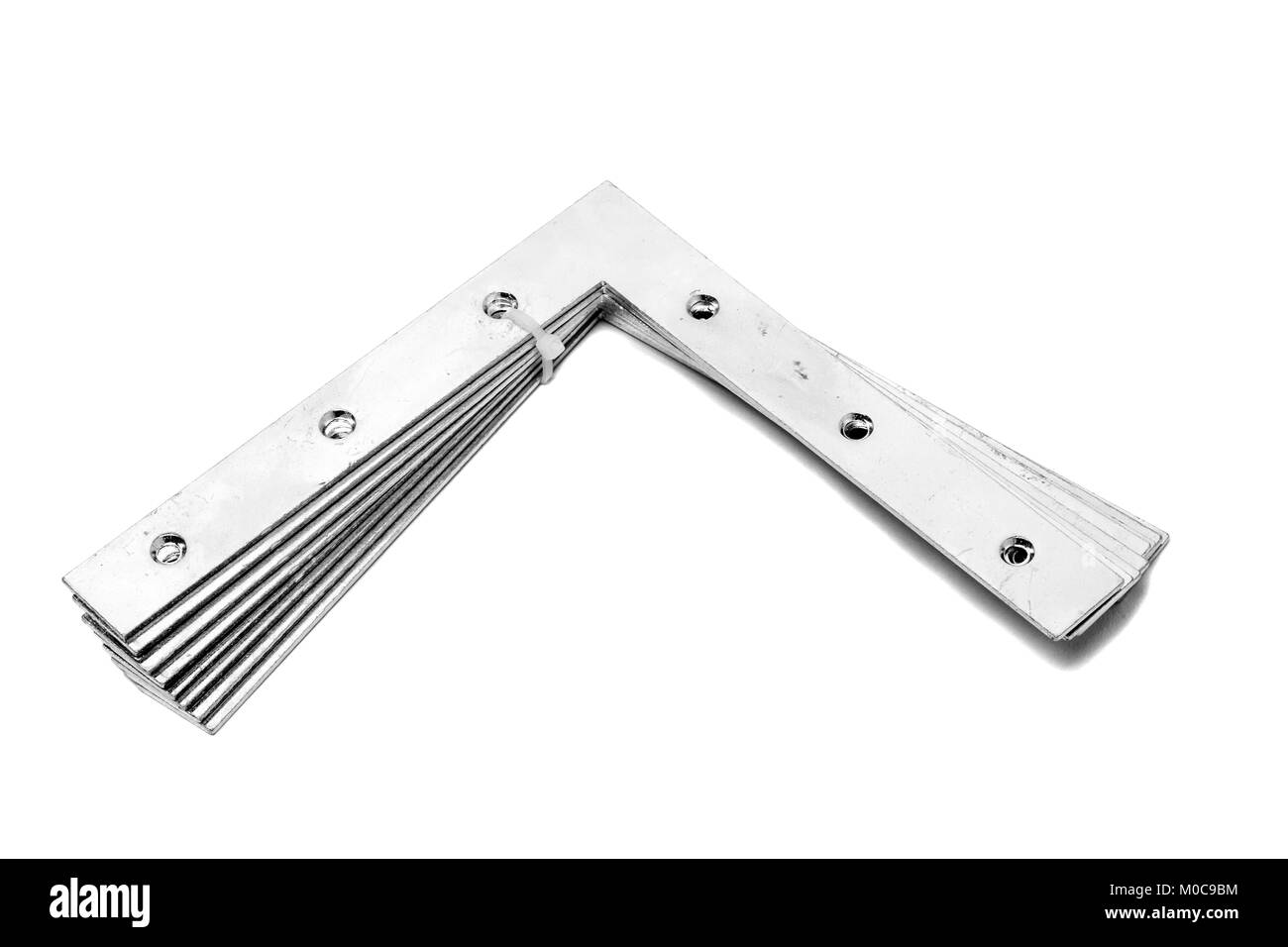 metal angle brackets isolated on white background Stock Photo - Alamy