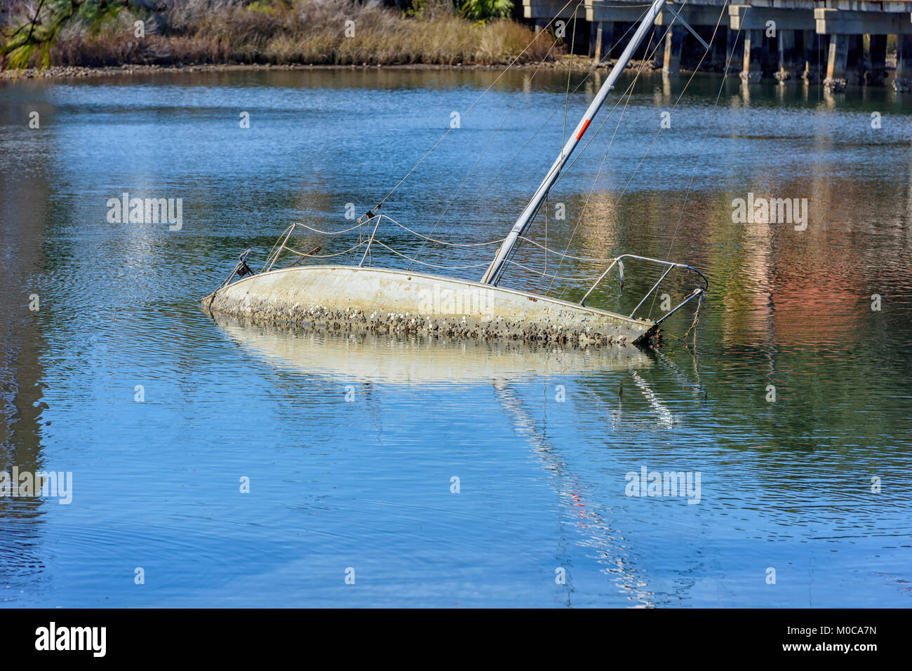 sailboat sunken in massalina bayou, panama city, florida Stock Photo