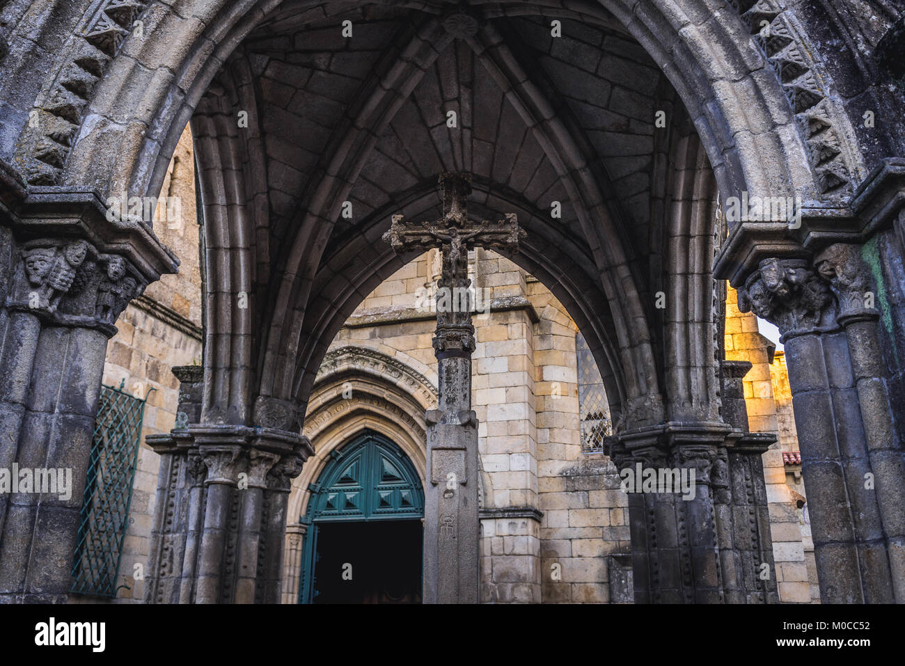 Gothic porch built for to commemorate the Battle of Salado in front of Collegiate church of Our Lady of Oliveira in historic centre of Guimaraes, Port Stock Photo