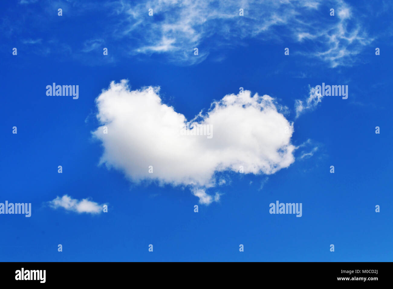 cloud in heart shape - blue sky background - sky photo texture Stock ...