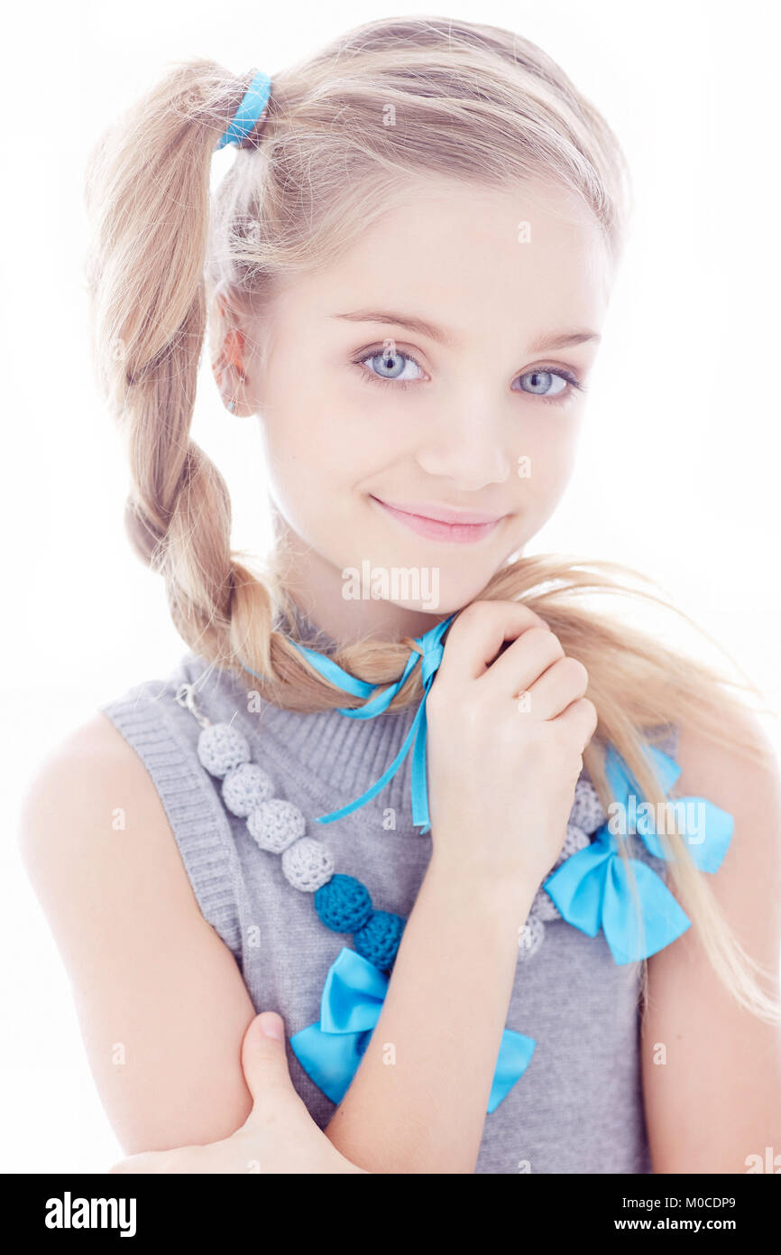 Cute little girl with long hair Stock Photo - Alamy