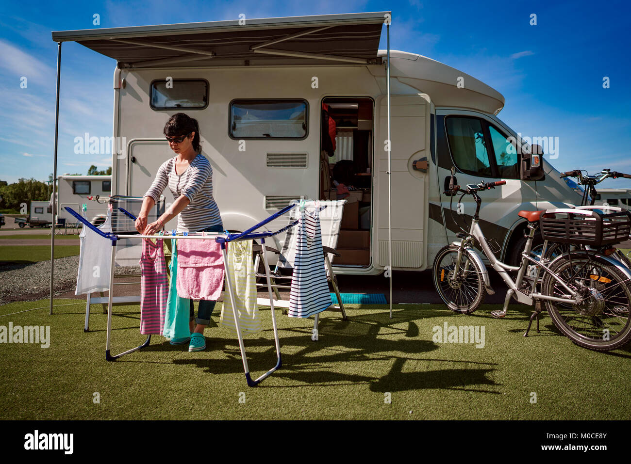 Washing on a dryer at a campsite. Caravan car VR Vacation. Family vacation travel, holiday trip in motorhome Stock Photo