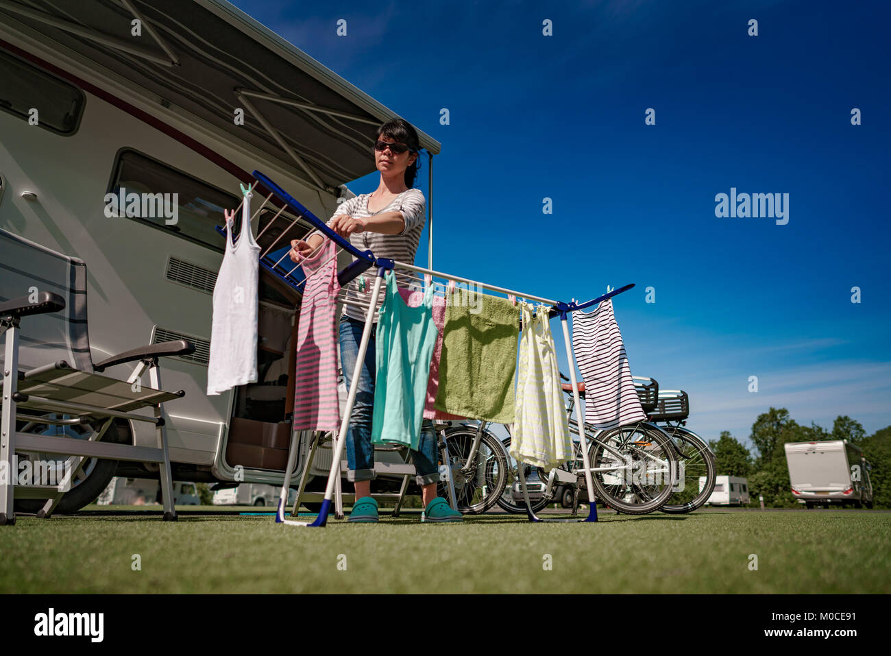 Washing on a dryer at a campsite. Caravan car VR Vacation. Family vacation travel, holiday trip in motorhome Stock Photo