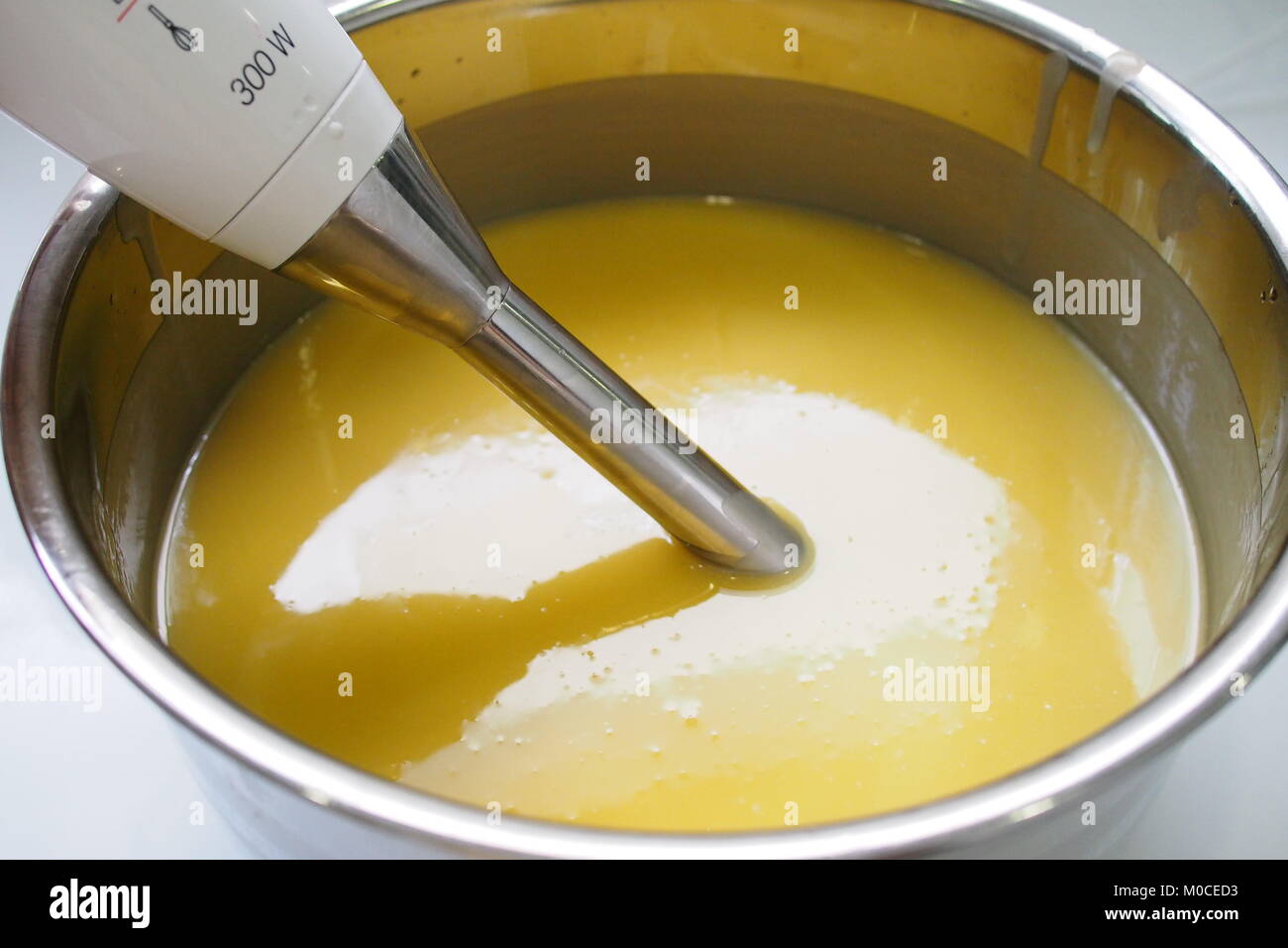 Process of homemade soap with stick blender Stock Photo - Alamy