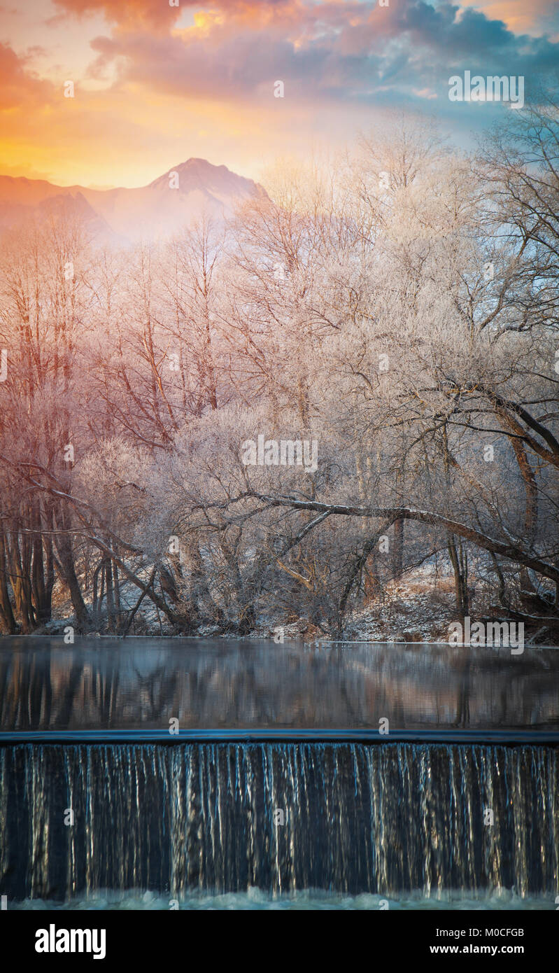 winter landscape. Forest in the background of mountains Stock Photo - Alamy