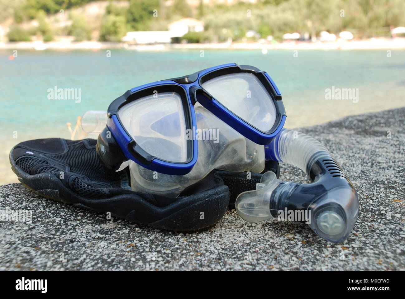 A snorkel and mask on the shingle beach at Spartohori on the Greek island of Meganissi on August 31, 2008. Stock Photo