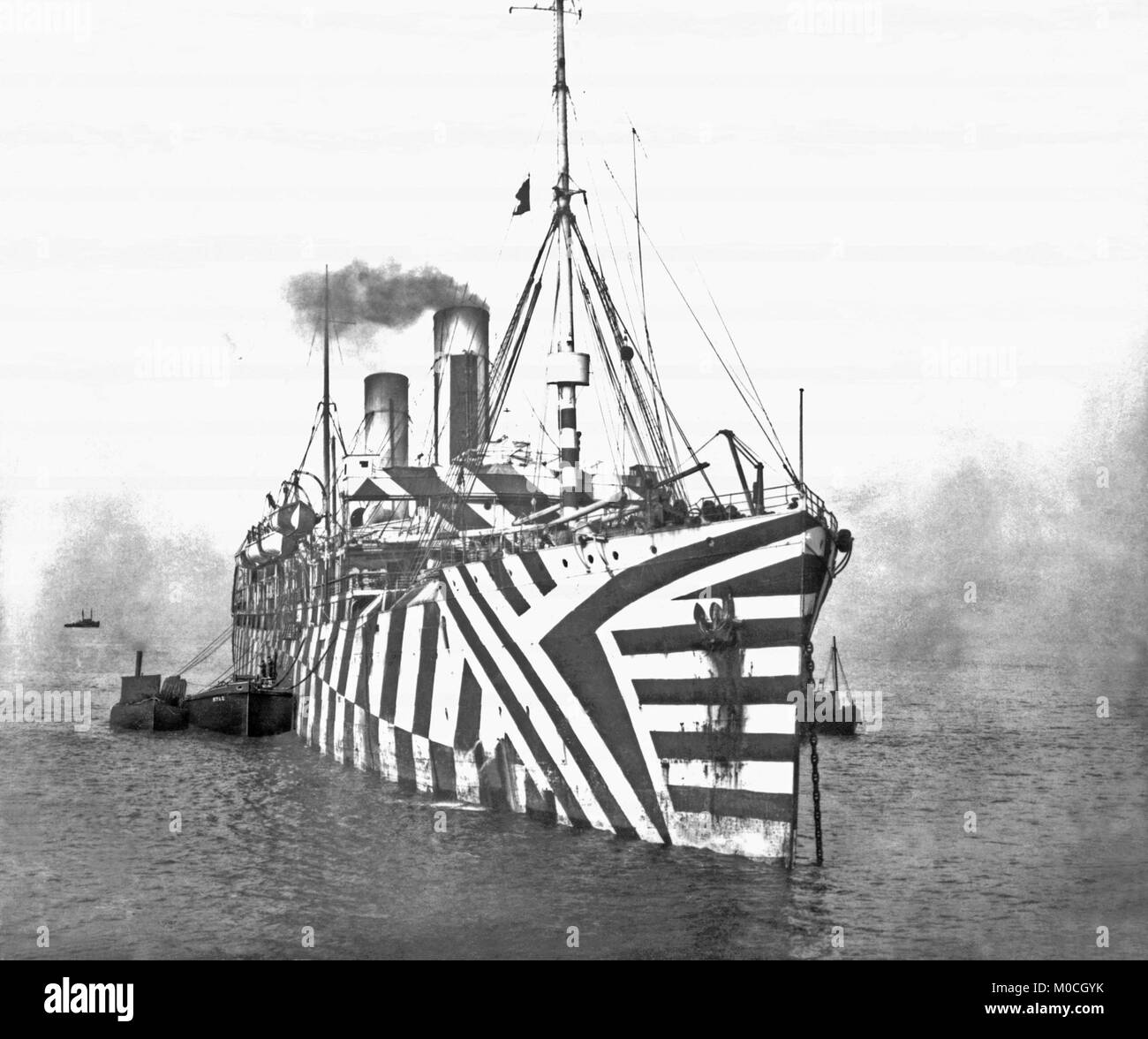 The 'Walmer Castle' under 'dazzle camouflage' (also known as razzle dazzle in the USA or dazzle painting) during World War I, c. 1917. Dazzle camouflage was used extensively in World War I and beyond. Credited to the British artist Norman Wilkinson, it consisted of complex patterns of geometric shapes in contrasting colours, interrupting and intersecting each other Stock Photo