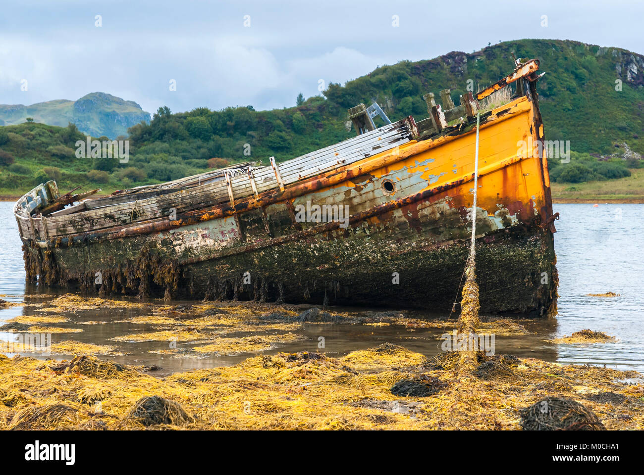 The gradually decaying wreck of 'Our Atalanta'  lying in Loch Craignish near Ardfern, Argyll and Bute, Scotland. 09 September 2007. Stock Photo
