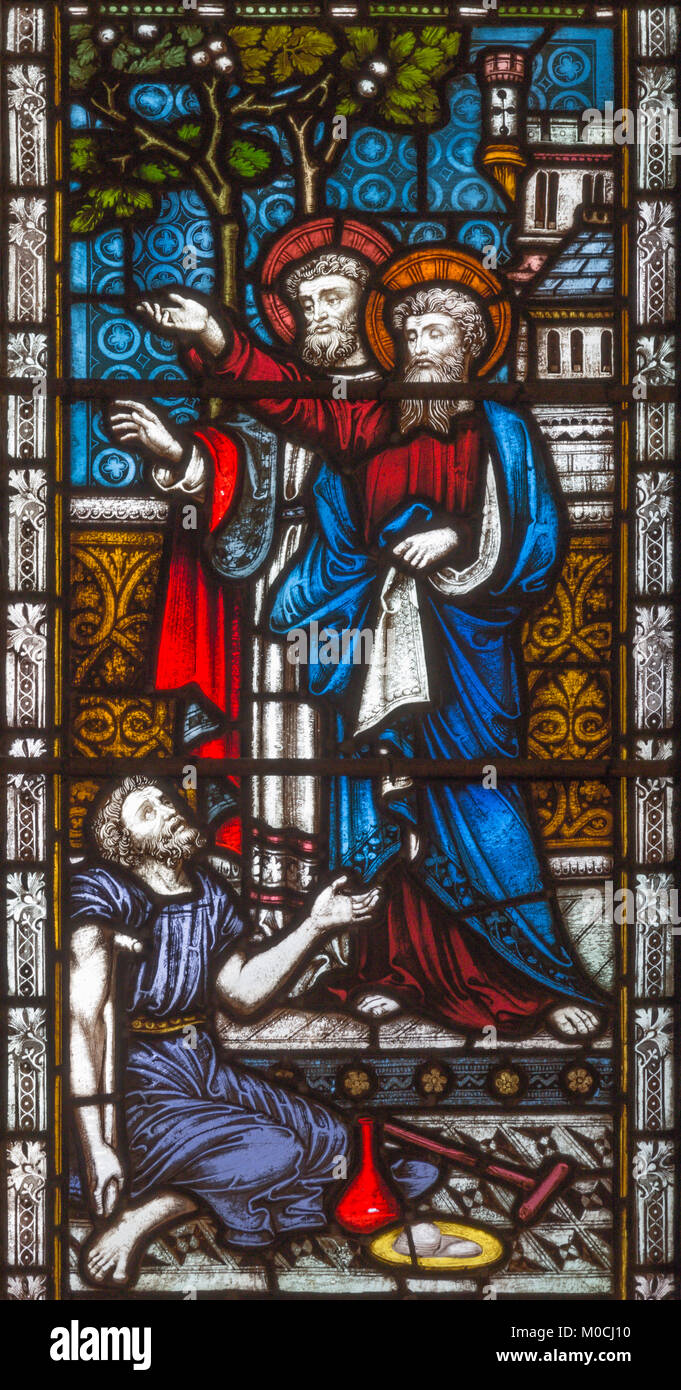 LONDON, GREAT BRITAIN - SEPTEMBER 19, 2017: The apostles Peter and John heal of paralytic in front of Temple in Jerusalem on the stained glass. Stock Photo