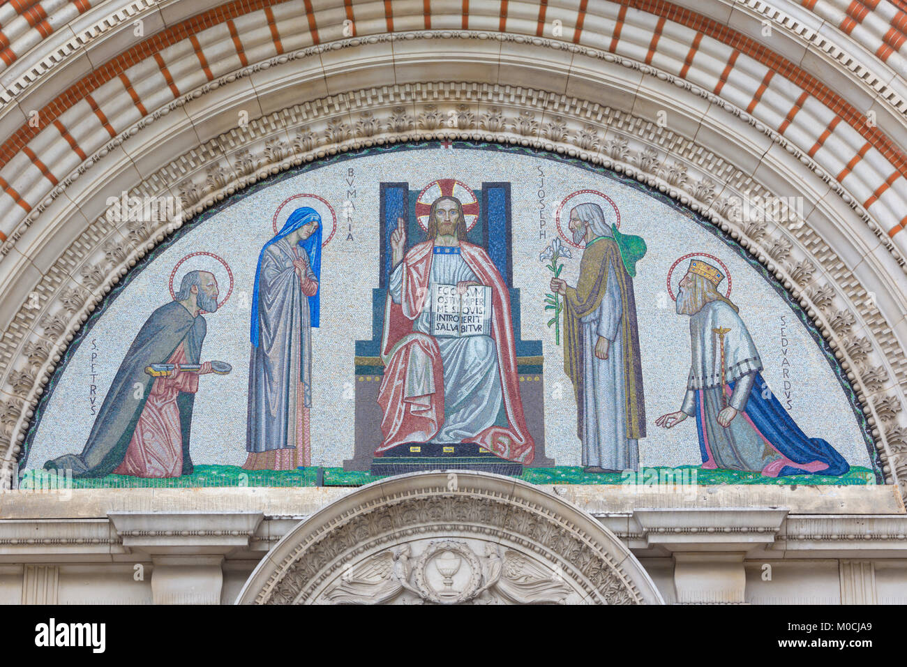LONDON, GREAT BRITAIN - SEPTEMBER 19, 2017: The mosaic of Jesus Christ the Pantokrator over the main portal of Westminster cathedral- Stock Photo
