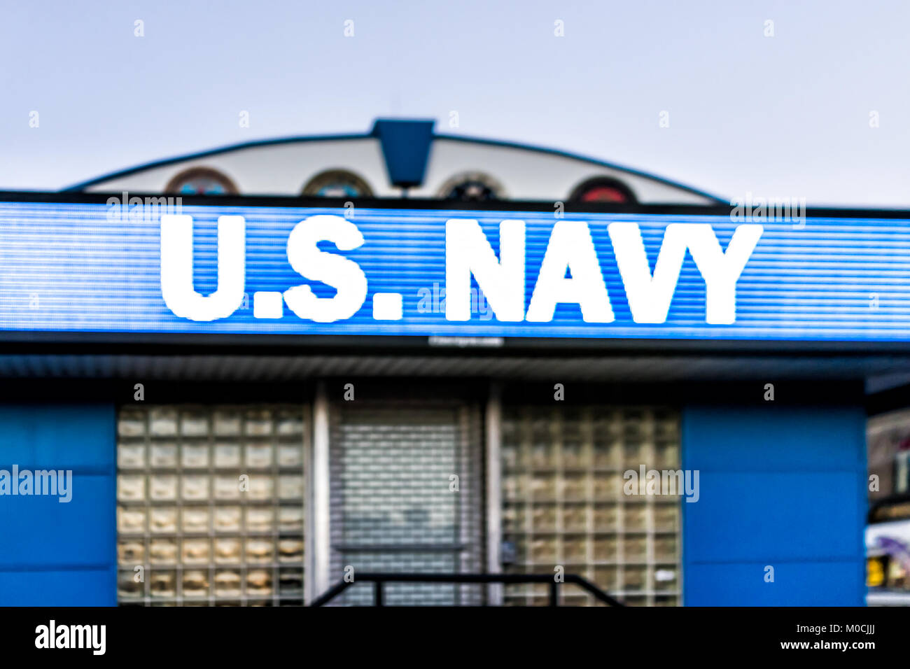 Bronx, USA - October 27, 2017: US Navy recruitment recruiting office large blue sign closeup in Fordham Heights center, New York City, NYC Stock Photo