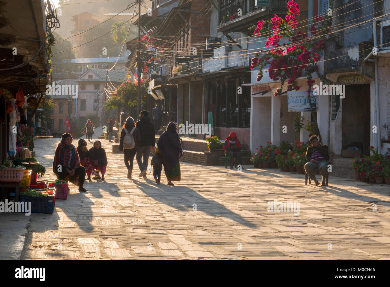 People in main pedestrian mall of Bandipur, Nepal Stock Photo