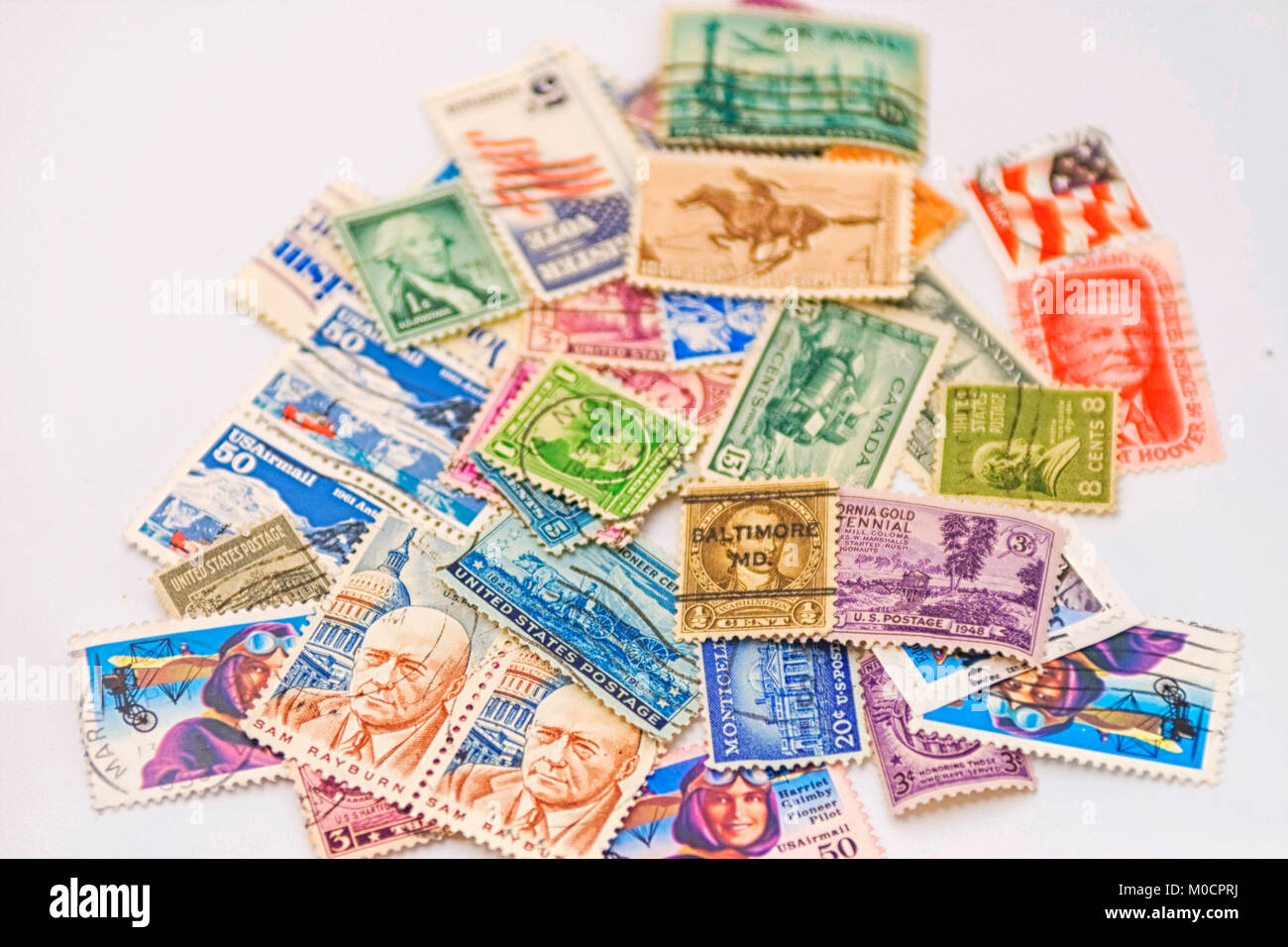 Bunch of old american postage stamps Stock Photo